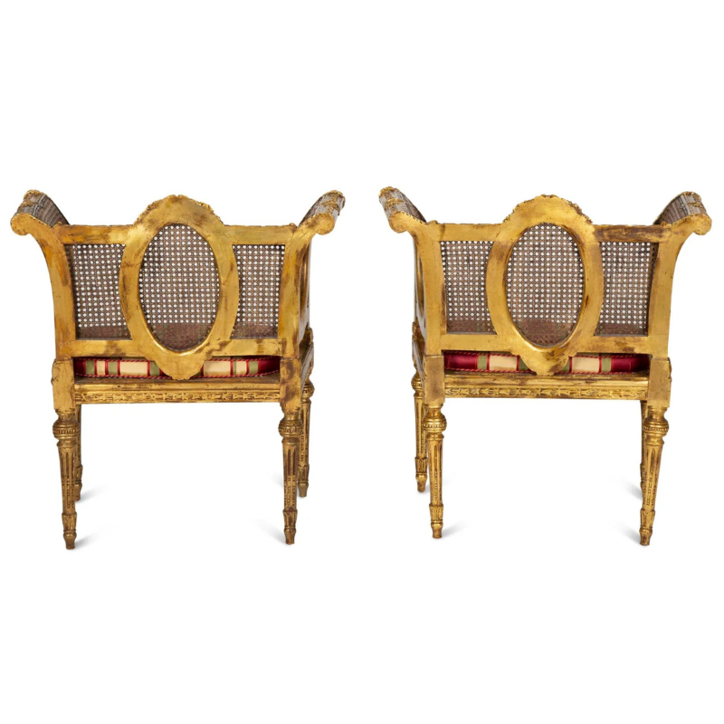 Pair of French Louis XVI Style Giltwood Cane-Back Benches with Red Silk Striped Cushions